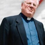 THE REVEREND DONALD GORDON AXFORD